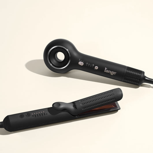 The Best Sellers Duo Set, featuring a black Axia HaloRing Hair Dryer, a standard black Le Duo Classic, displayed on a beige background