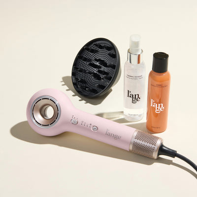 Curl Crush Value Set, featuring a Blush Axia,  Axia Diffuser, Thermal Magique, and Sorbet, displayed on a beige background