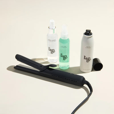 Curl Power Value Set, featuring a Black Le Duo Classic Standard, Thermal Magique, Salt & Sea,  and Deja Vu, displayed on a beige background