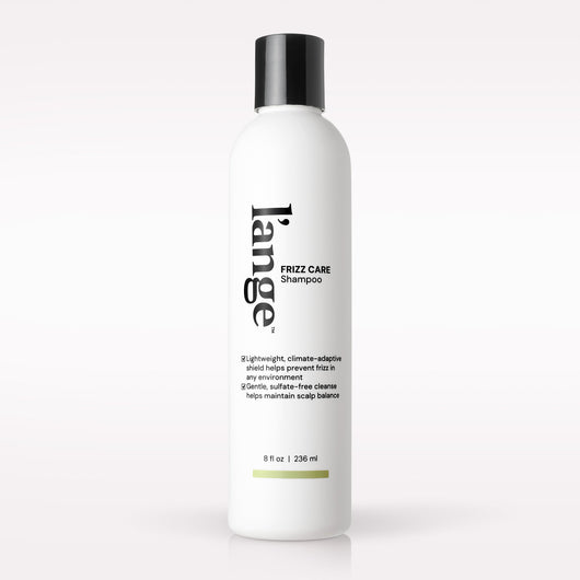 L’ange Frizz Care Shmapoo on a blank background 