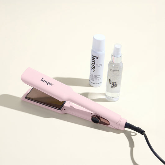 The Sleek Era Value Set, featuring a blush 1.75in Le Titane , top coat, and thermal magique, displayed on a beige background