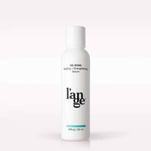 L’ange Ms. Bond Building + Strengthening Serum on a blank background 