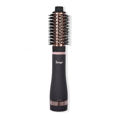 A sleek black and rose gold heated styling brush with a round barrel and bristles, designed for effortless hair styling.