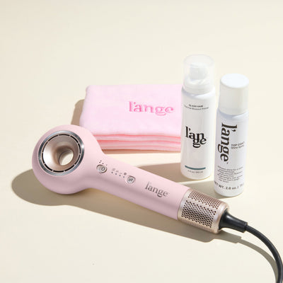 Mane Event Value Set, featuring a Blush Axia, a Blush hair wrap towel, Glass Hair, and Top Coat, displayed on a beige background